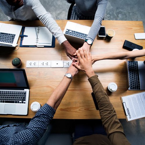 diverse-medical-team-of-doctors-looking-at-camera-while-holding-clipboard-and-medical-files-risclk7u6lrytmxq95jjfndem1bijp1zic7xvy8v0g
